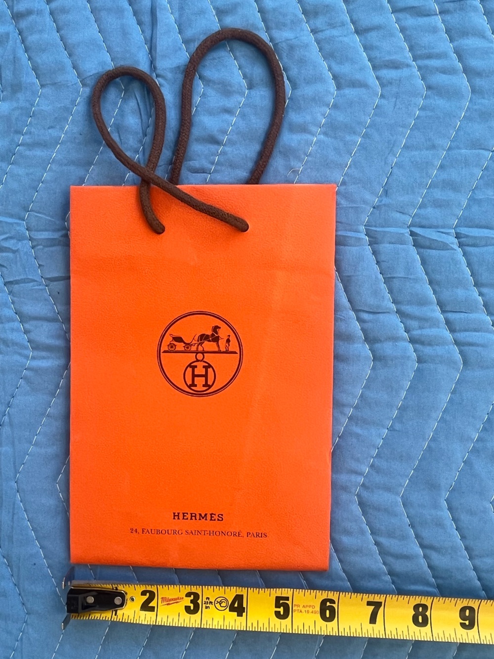 HERMES • shopping tote • instantly recognizable luxury • logo & iconic orange